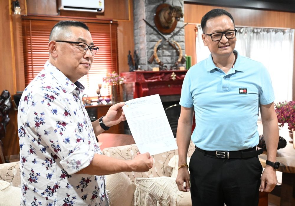 (left) Apostle Rev Louliehu Yimsung has been appointed as the Ambassador of Helping Hands, Nagaland.